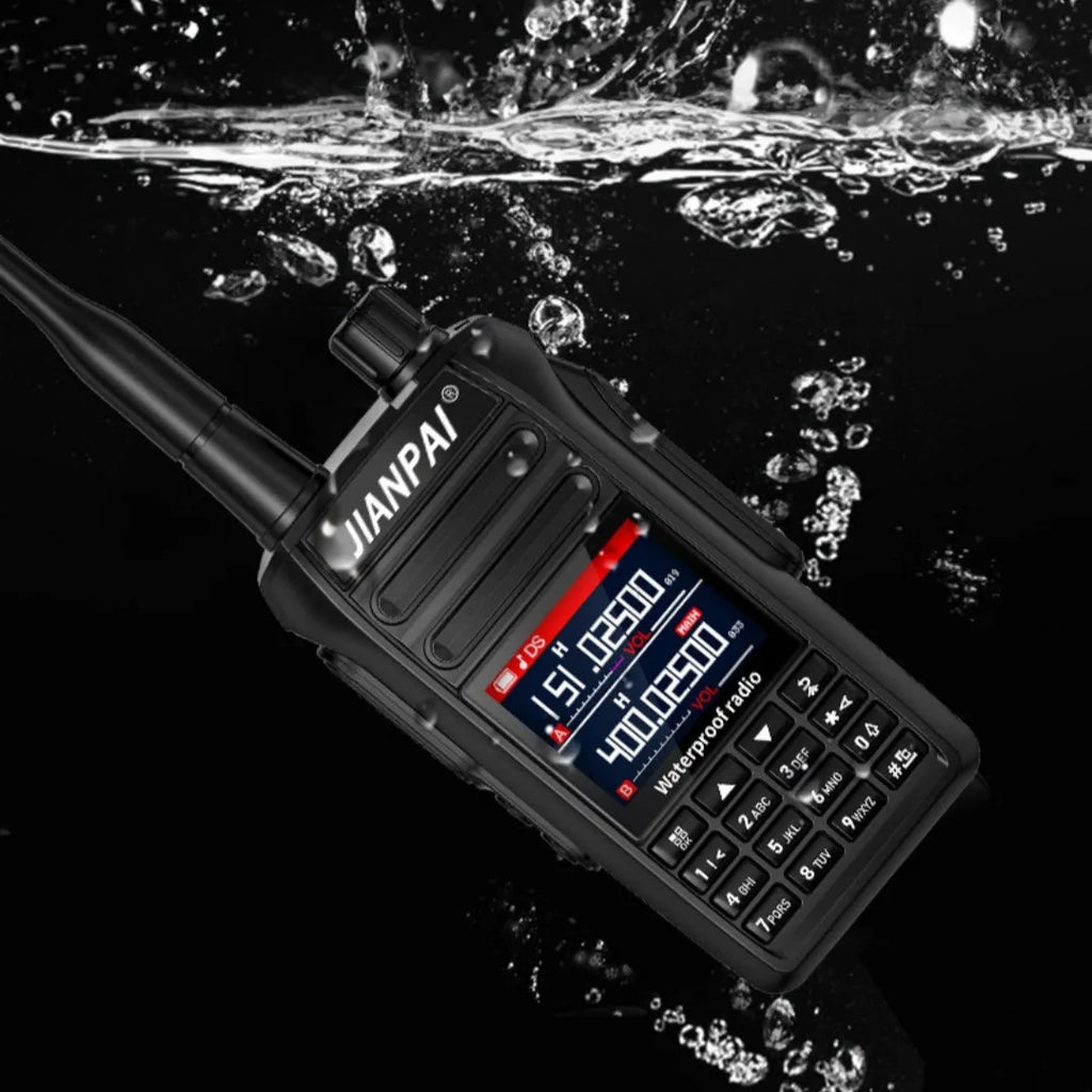 Black waterproof aviation interphone radio with full band coverage, shown with battery, antenna, charger, and headset microphone.