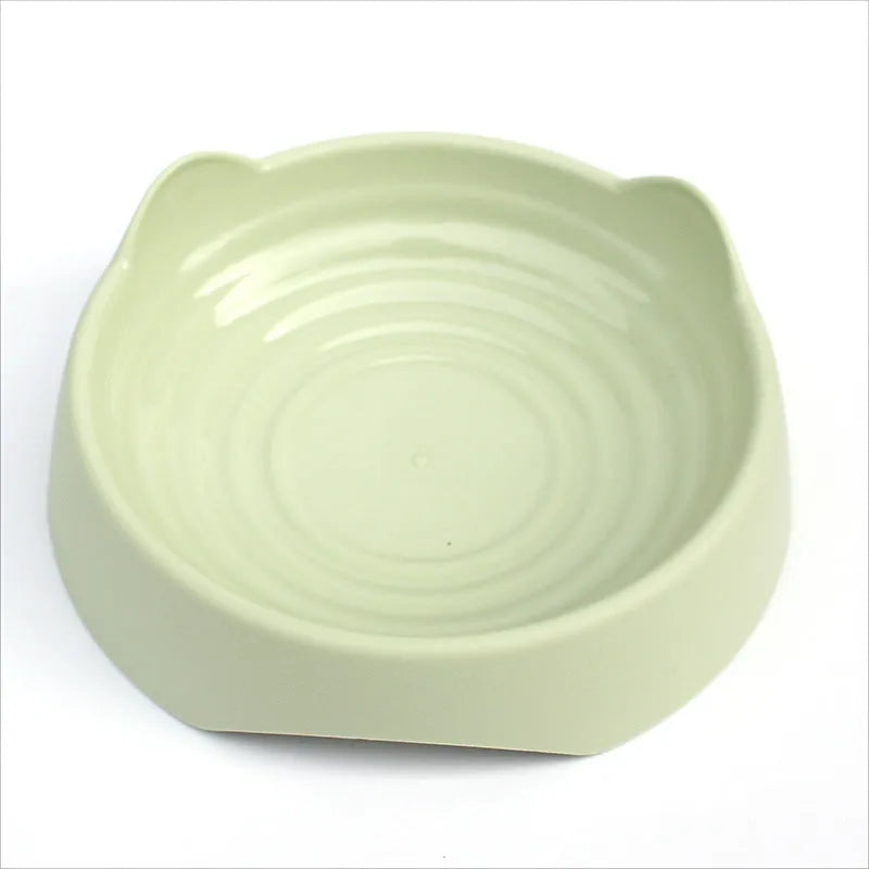 Blue ceramic dog slow feeder bowl with maze design and raised cups for slowing down fast eating.