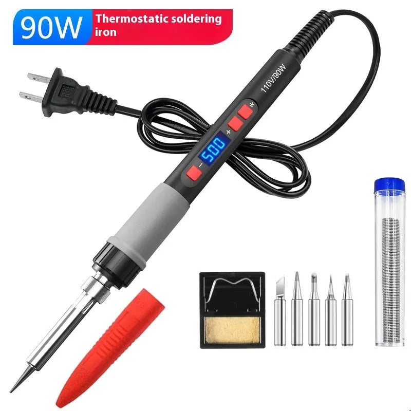 Grey 90W electric soldering iron with digital display, UK plug, and five soldering tips on a pen holder.