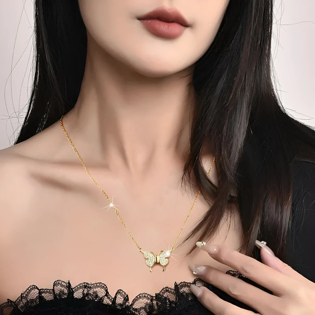 Women's magnetic snap butterfly clavicle chain necklace in gold finish showing twisted chain detail