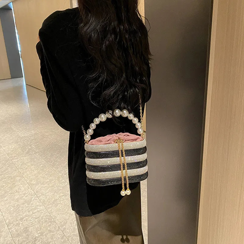 Women's retro pearl beaded crossbody bag in soft PU with round shape and single shoulder strap