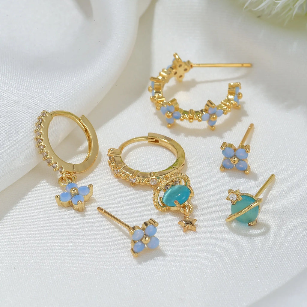 Flower design ear studs with zircon mosaic detail in gold and silver colours