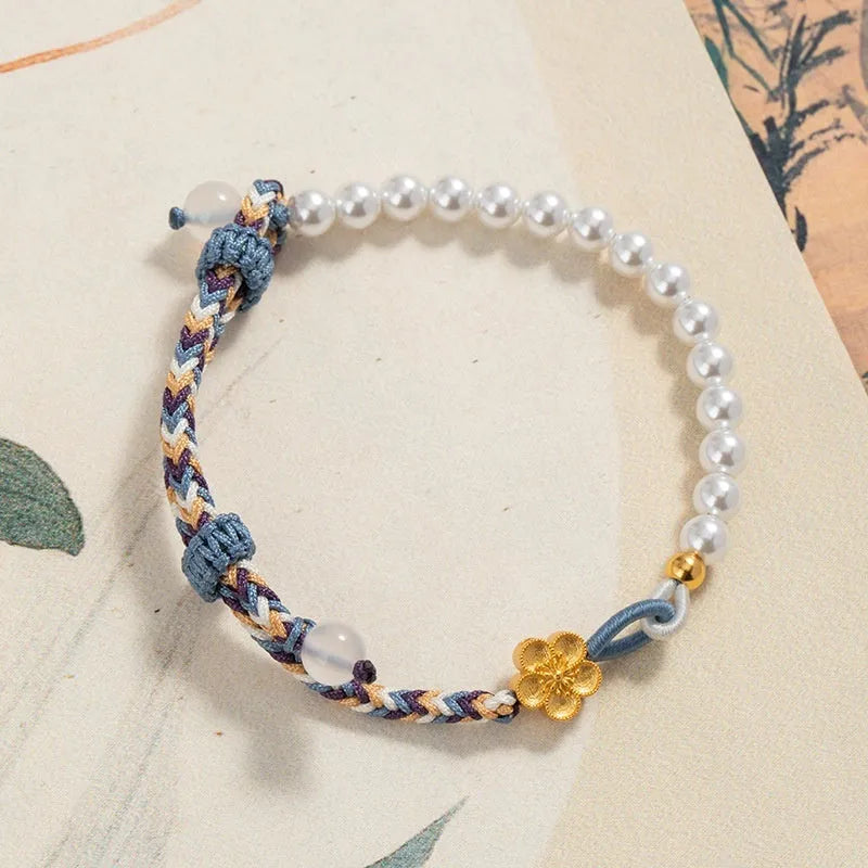 Peach-coloured Chinese flower weaving carrying strap with pearl accents on cord material