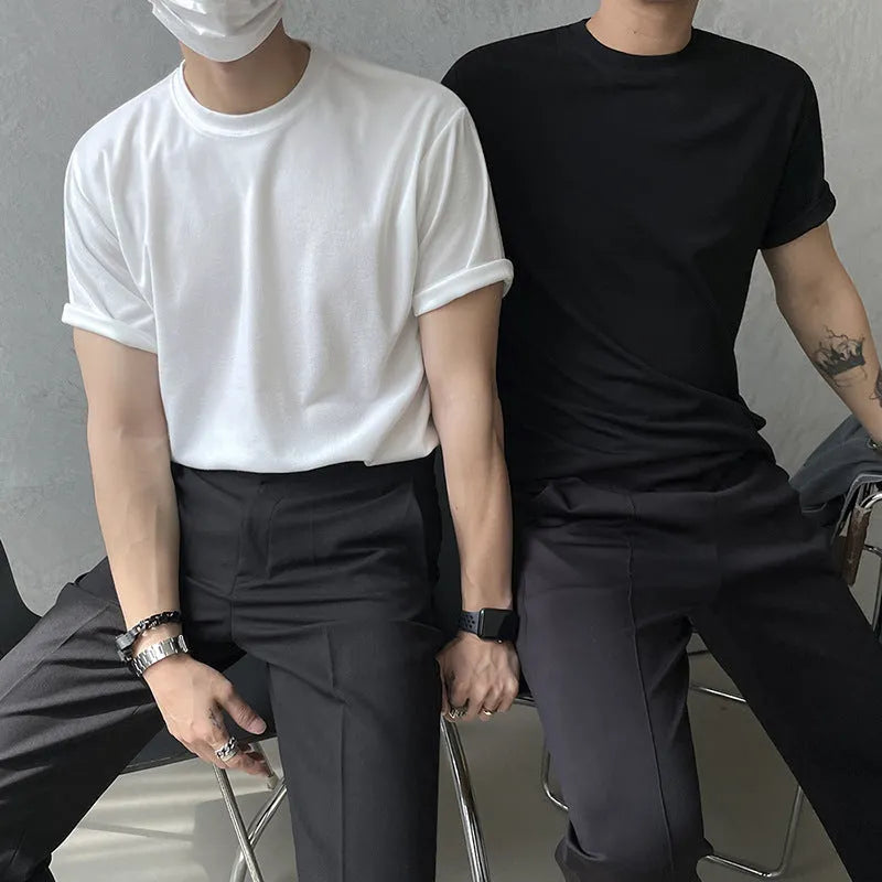 Cotton half sleeve t-shirt for men in slim fit available in black and white solid colours