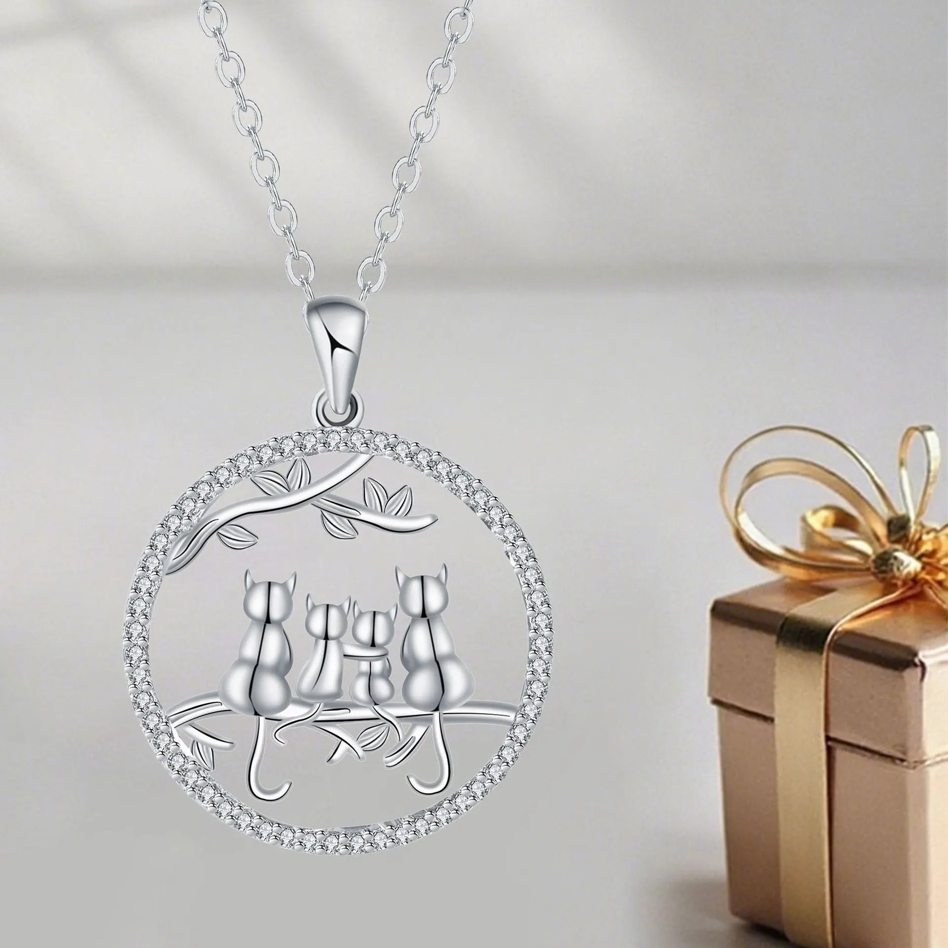 Women's copper necklace with four kitten pendant design and cross chain