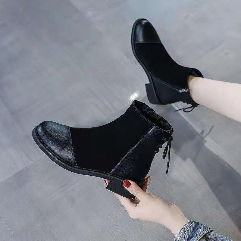 Women's black knee-high Martin boots with side zipper and round toe