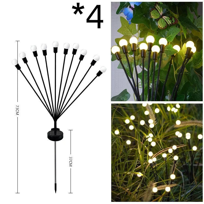 Solar-powered LED ground spike garden light with automatic sensor in lawn