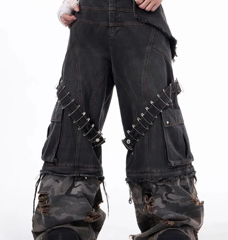 Men's grey jeans with camouflage print panels and ribbed texture panels on the legs.