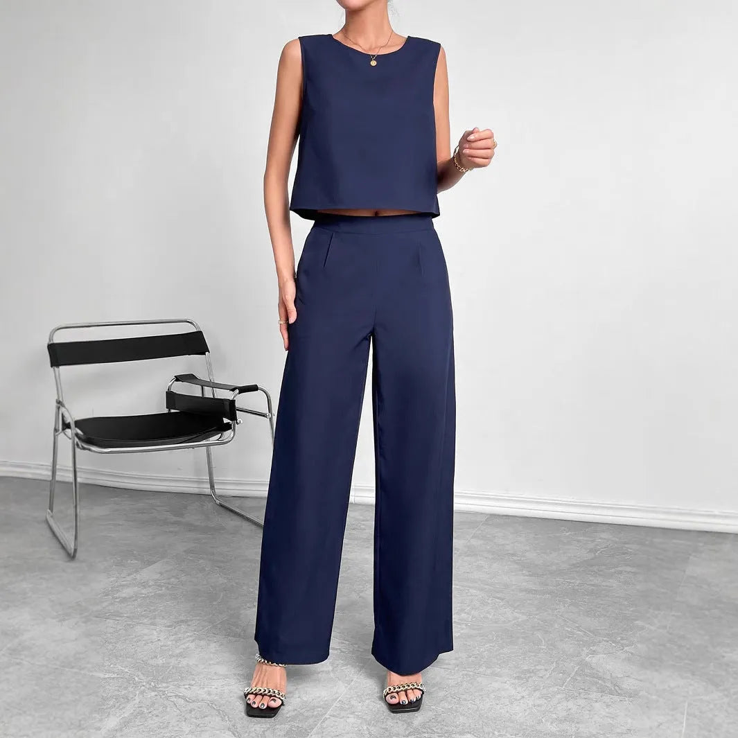 Women's red sleeveless top and wide-leg trousers two-piece polyester co-ord set on hanger