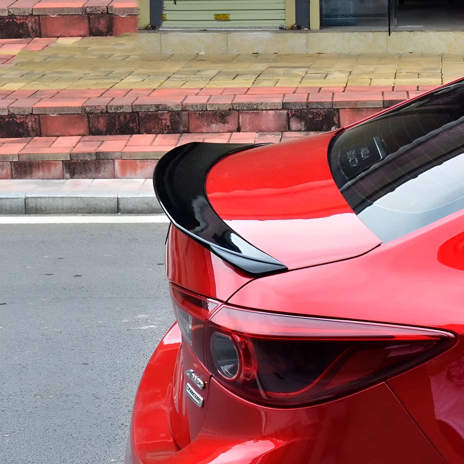 Bright black sports tail blade trim for Mazda 3 Axela Exela with fixed wind surround design