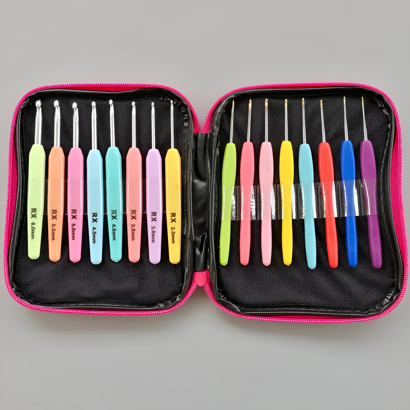 Set of 16 crochet hooks in various sizes with two handle types, laid next to a grey PU storage bag.