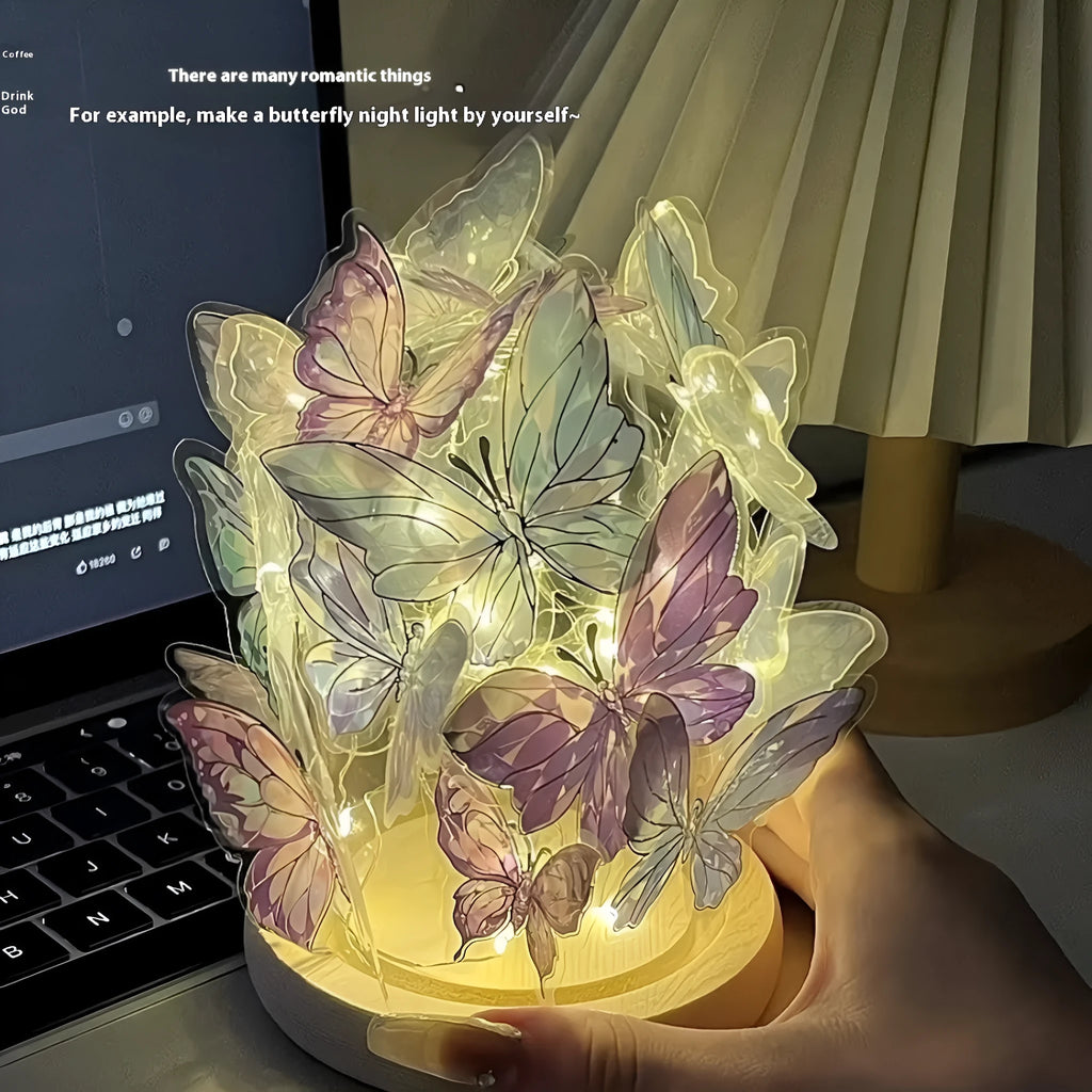 Handmade butterfly-shaped night lamp with glass shade on a raw wood base.