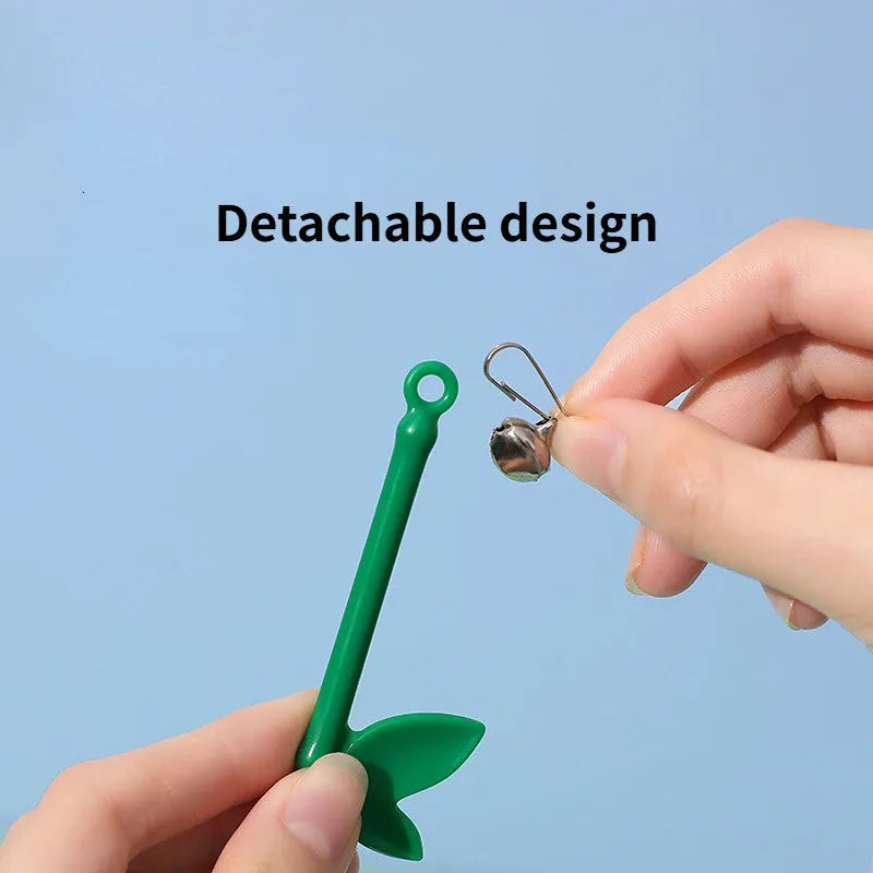 Green interactive cat wand toy with feathers and a bell on a durable plastic handle.