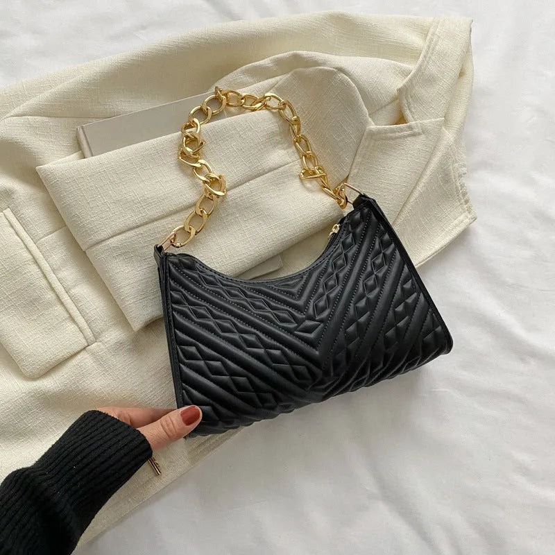 Black PU leather vertical square shoulder bag with chain strap, soft handle, and 3D outer pockets