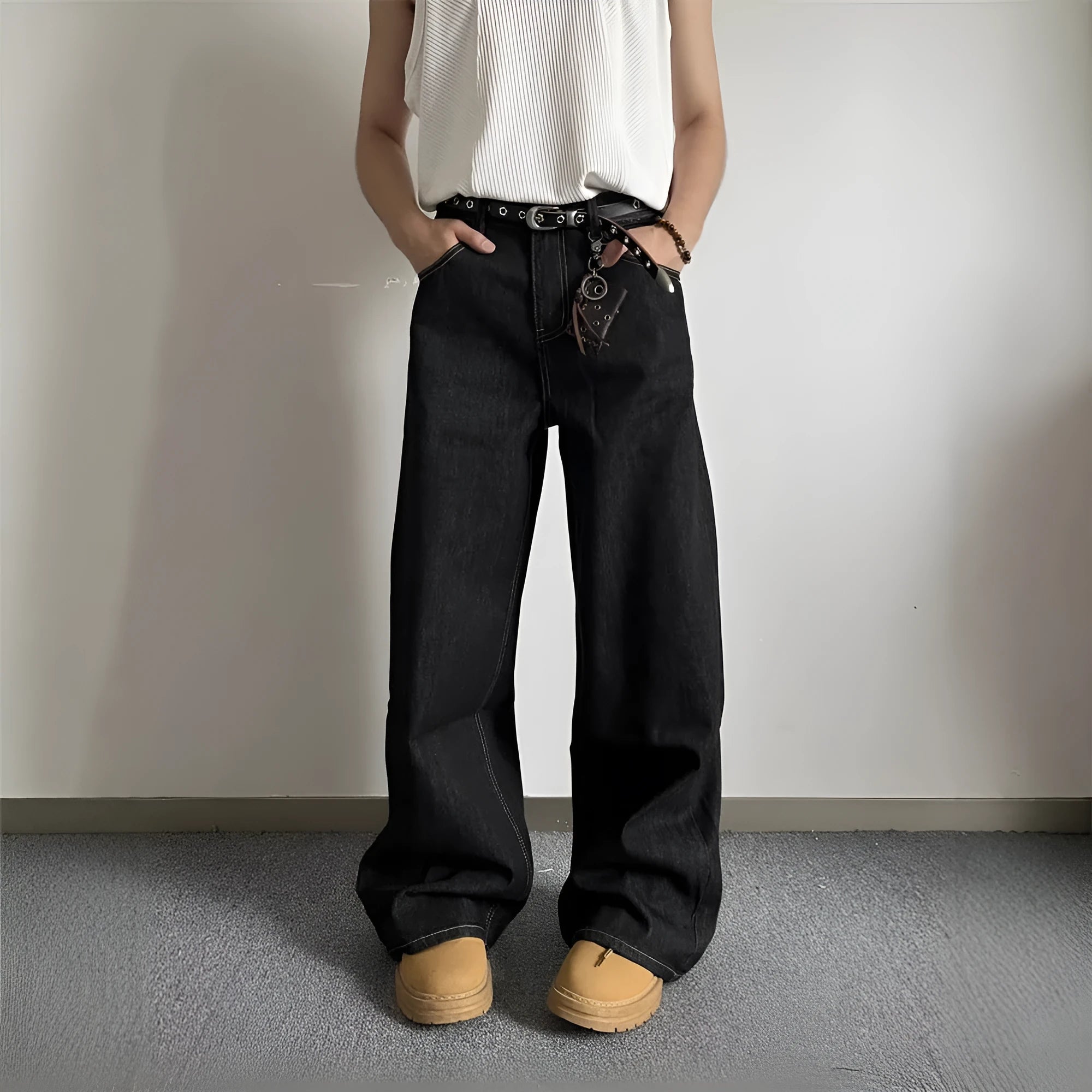 Black loose wide-leg retro jeans with a straight-leg cut and zip fly on a model.