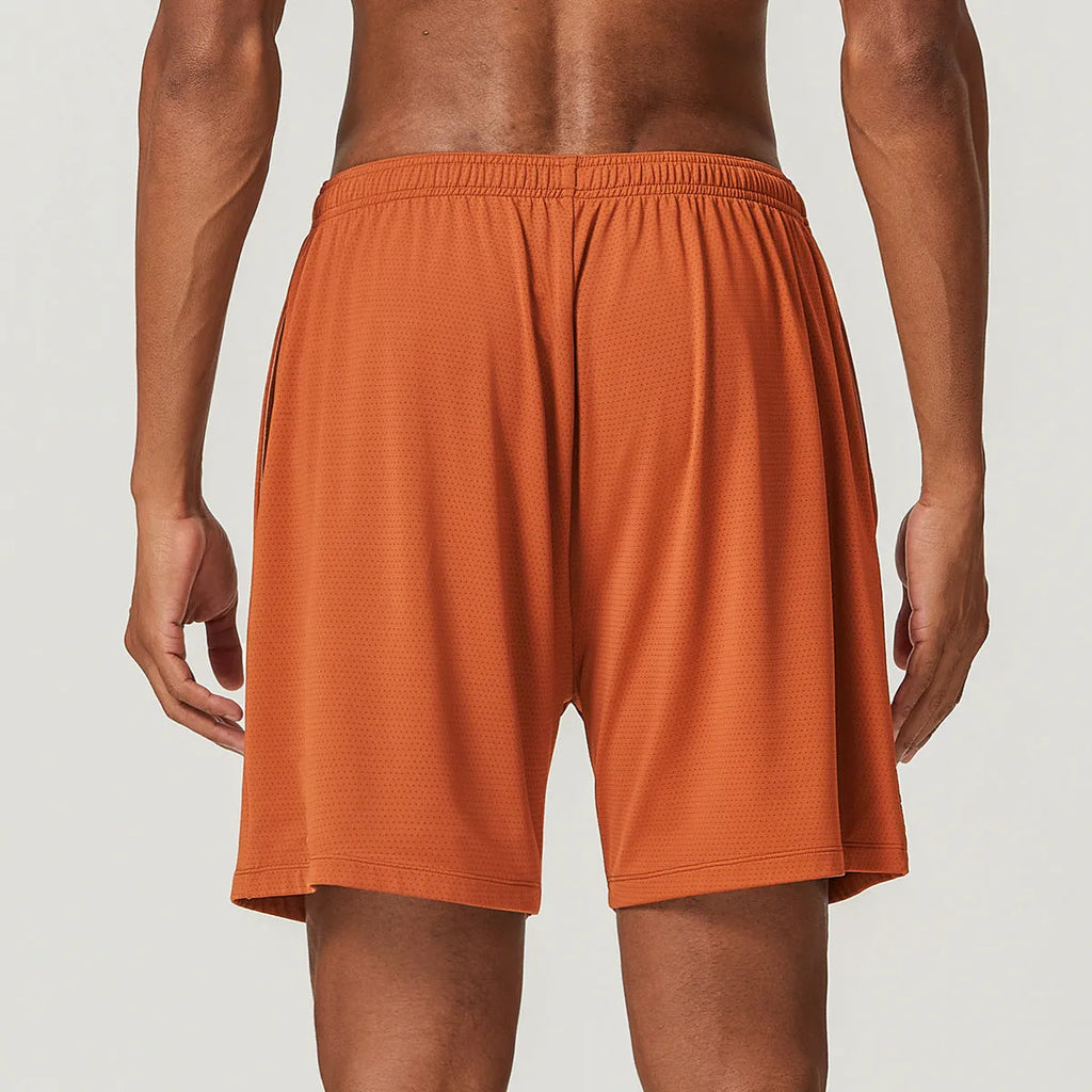 Men's quick-drying nylon running shorts in sky green, shown with mid-waist and short length design.