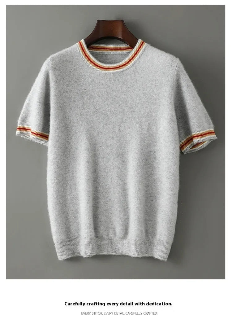 Men's grey round neck short sleeve wool pullover sweater laid flat.