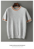 Men's grey round neck short sleeve wool pullover sweater laid flat.