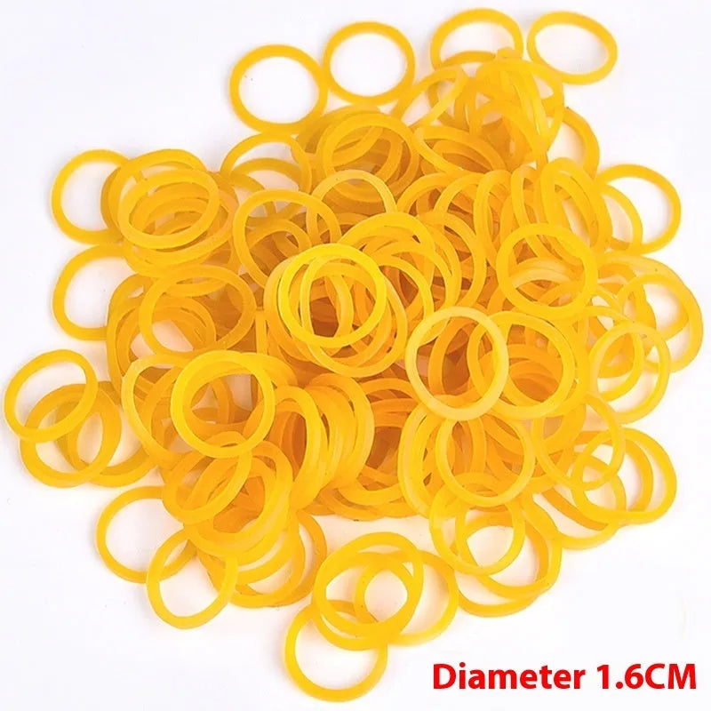 500g pack of bright yellow rubber bands showing assorted sizes from 25mm to 70mm diameter.