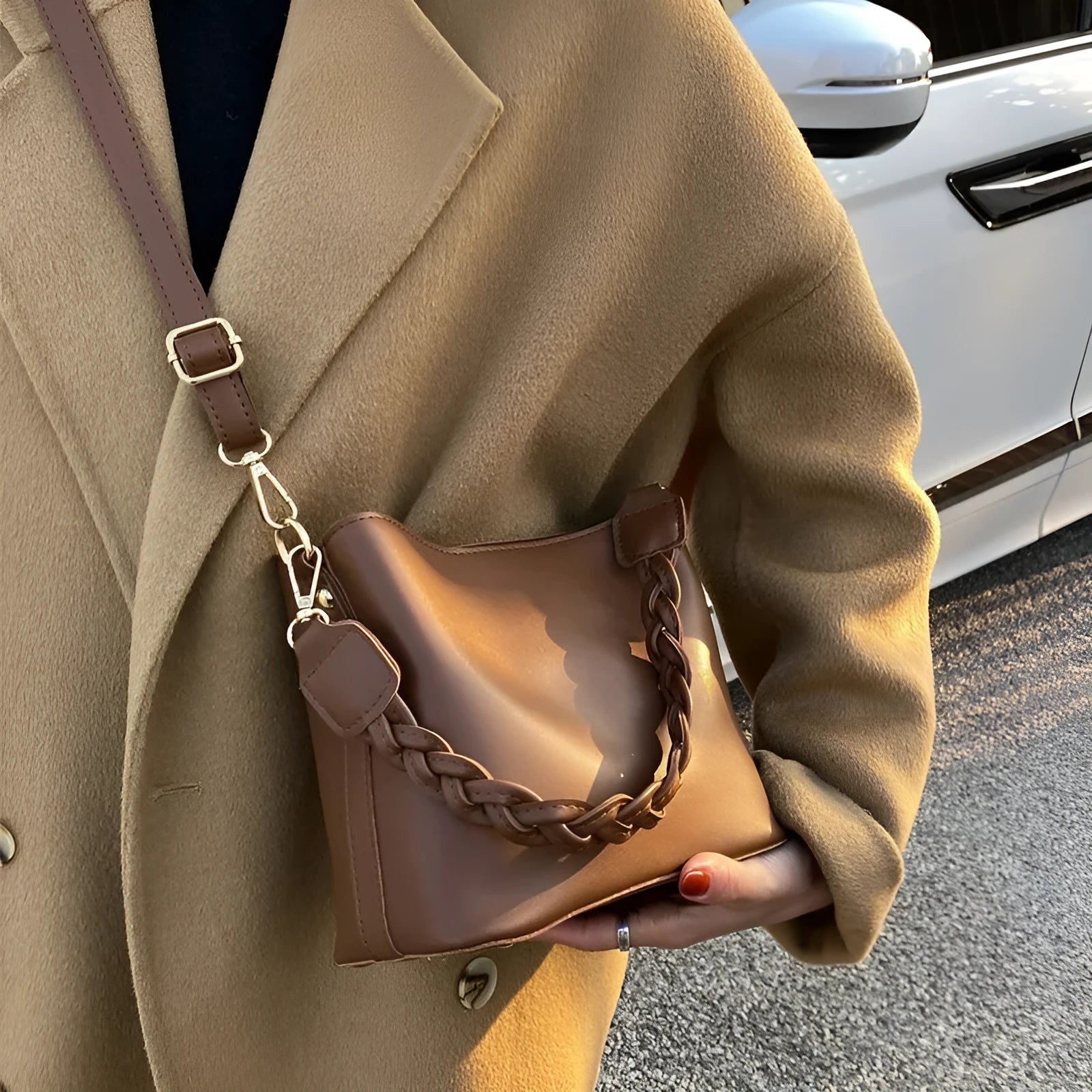 Retro woven PU leather crossbody bucket bag in khaki colour showing bucket shape and shoulder strap