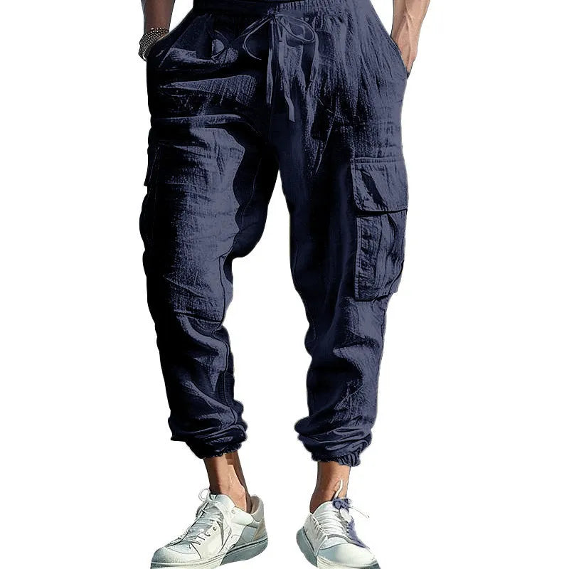Men's linen casual trousers with ankle ties and drawstring waist in solid colour