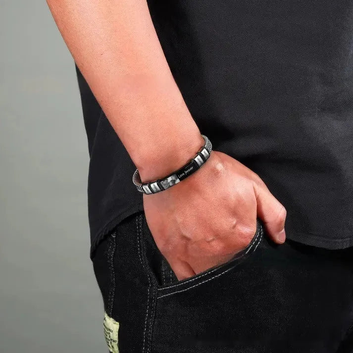Titanium steel lettering bracelet with leather rope adjustable closure showing heart-shaped design detail