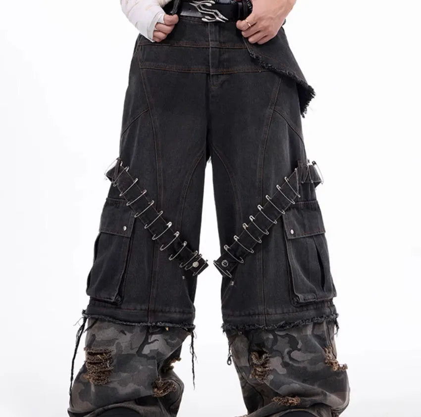 Men's grey jeans with camouflage print panels and ribbed texture panels on the legs.