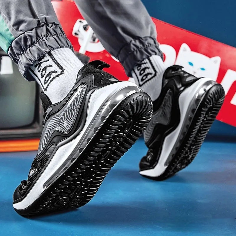 Men's Space Black and Space White casual shoes with air cushion and rubber sole.