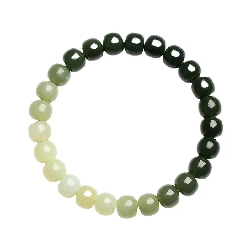 Natural Hetian jade bracelet with water gradient colouring showing polished stones in casual unisex design