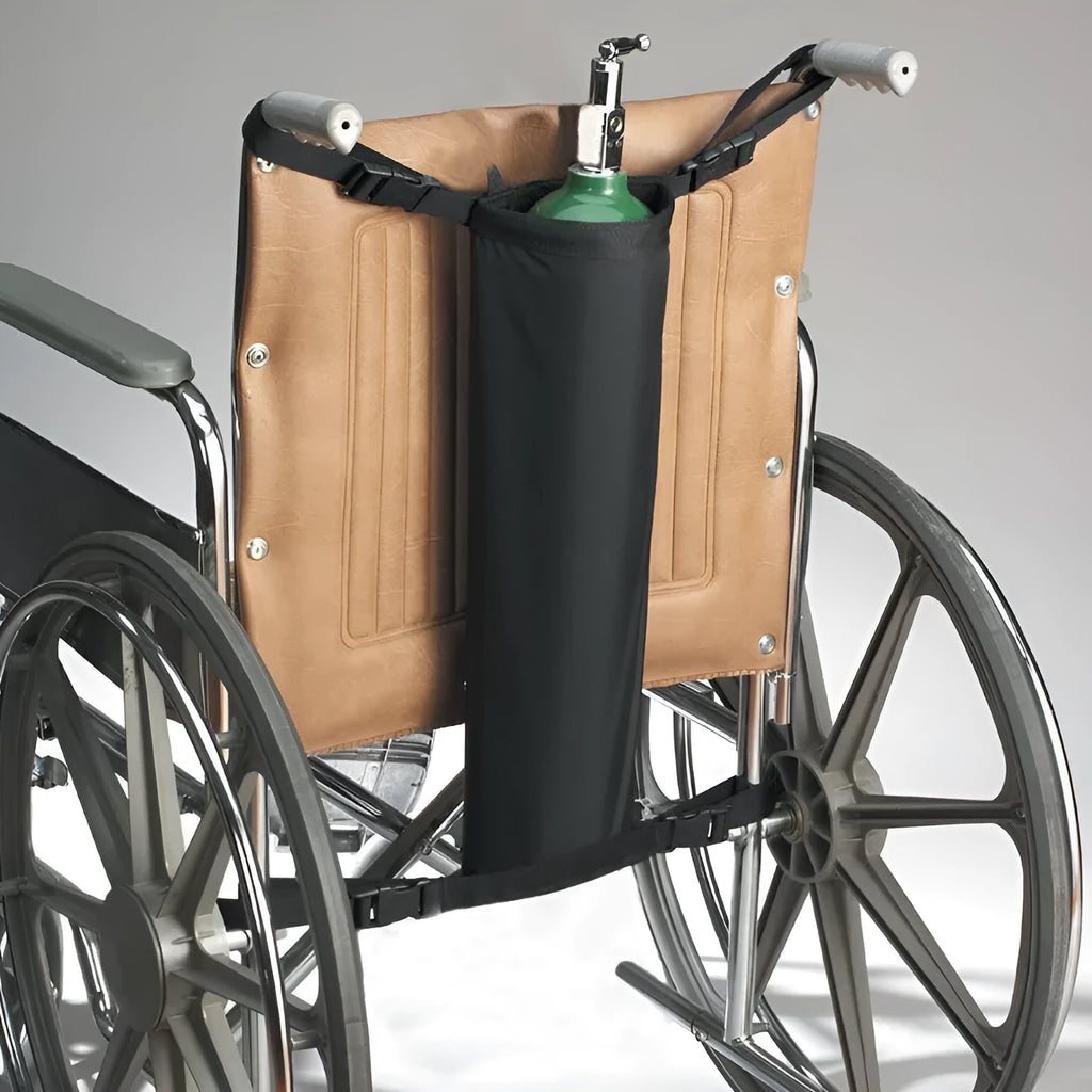 Black cylindrical Oxford cloth pannier bag attached to a wheelchair for oxygen cylinder storage.