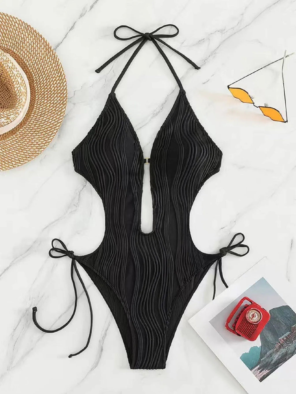 Women's black lace-up triangle bikini swimsuit with adjustable front detail