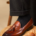 Men's black tassel loafers with genuine leather upper and British style detailing