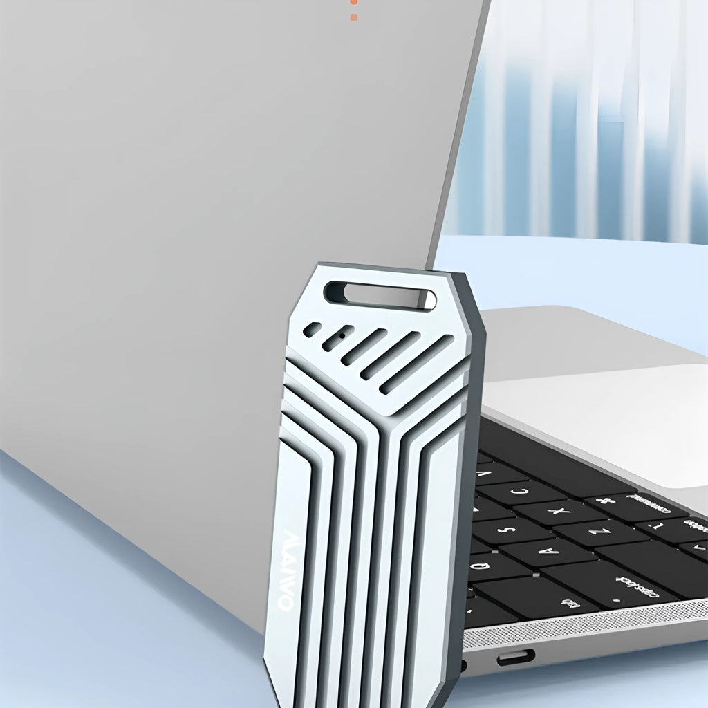 Silver aluminium Thunderbolt 4 external SSD enclosure for M.2 NVMe drives, showing compact size.