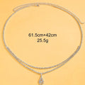 Gold and silver water drop pendant waist chain for women with rhinestones and tassel detailing.