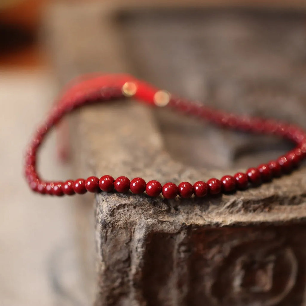 Purple gold sand cinnabar bracelet with geometric shape and Chinese design