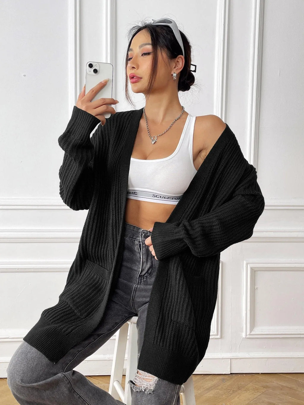 Women's dark green acrylic cardigan with double pockets and regular sleeves