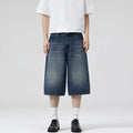 Men's straight-leg denim shorts in cropped length showing vintage blue colour option