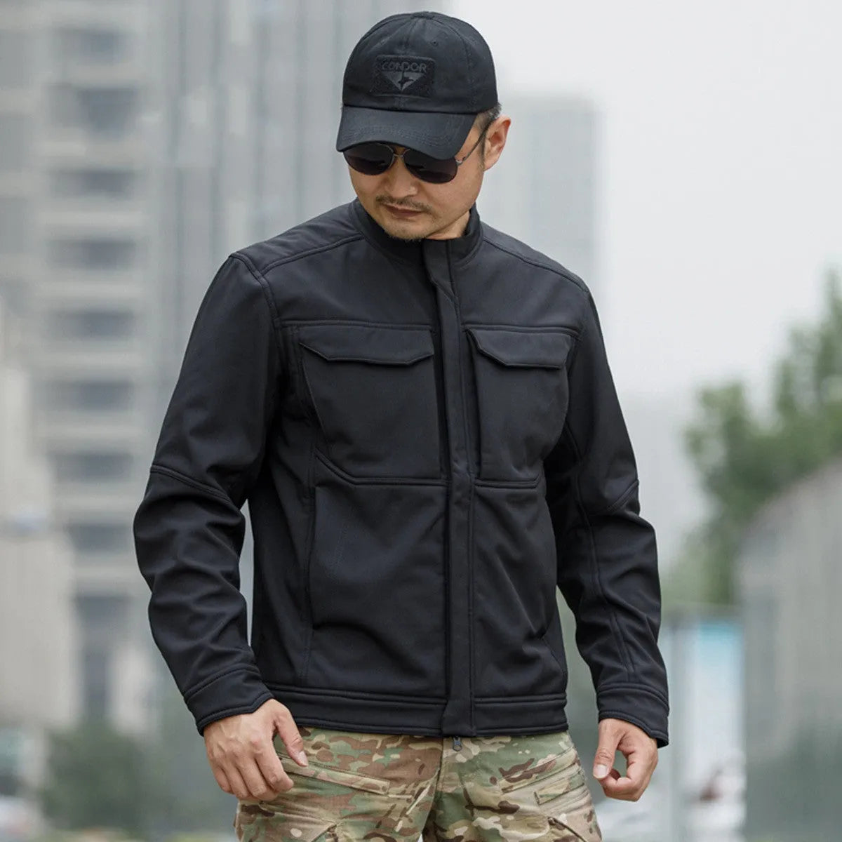 Bone Frog Peak Breaker soft shell mountaineering jacket in black, shown as a cardigan-style outdoor coat.
