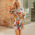 Orange floral striped lace V-neck long sleeve mini dress on hanger