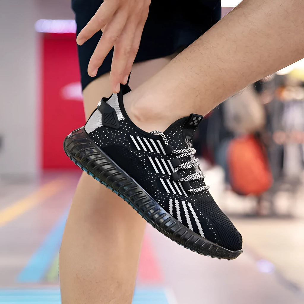 Men's breathable flying fabric sports shoes in black, white, or khaki with mesh lining and round-toe design