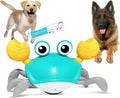 Blue and red electronic crawling crab dog toy with lights, shown on a floor.