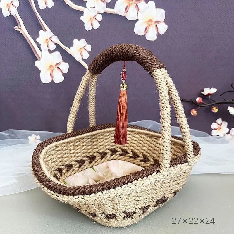 Round hand-woven hemp rope basket in a natural colour with a flat base.
