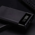 Digital display power bank kit with black plastic shell and multiple USB charging ports