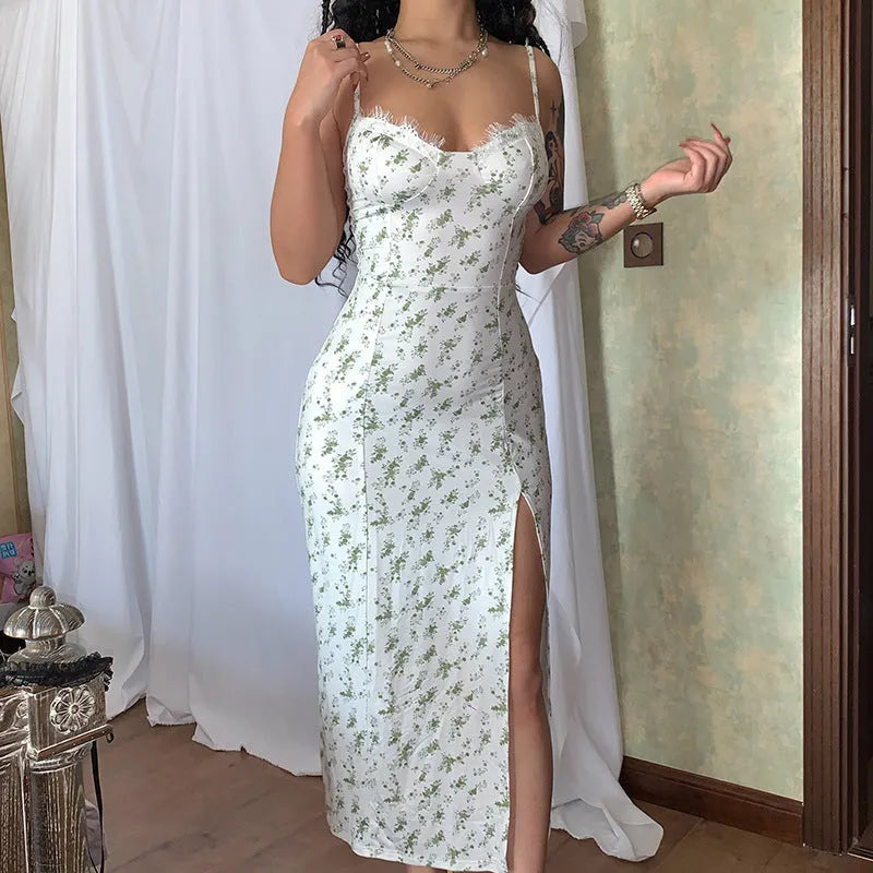 Blue lace flower print long dress with thin suspender straps and a front slit.