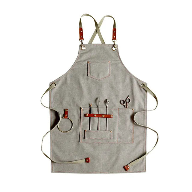 Canvas apron with cross-back straps in camel colour for kitchen and gardening protection
