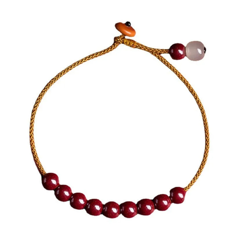 Hand-woven cinnabar bracelet with geometric design and traditional Chinese style