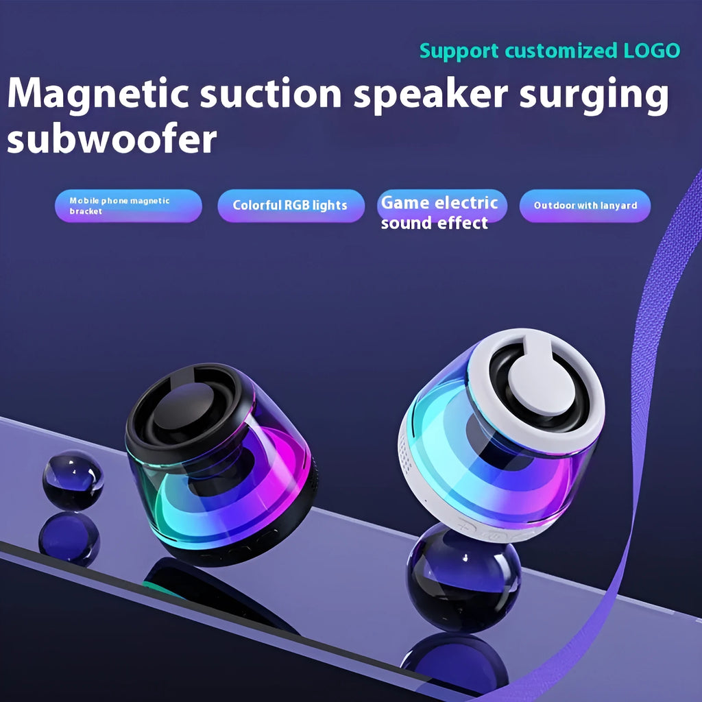 Compact black or white portable Bluetooth speaker with magnetic base and built-in ambience lighting.