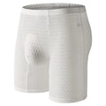 Men's lace boxer underwear in a lengthened hip lifting design on a solid colour background.