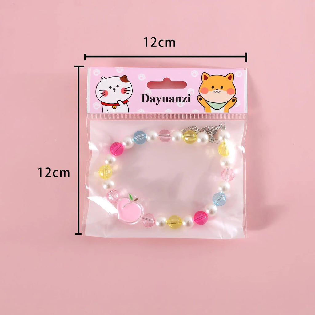 Colourful plastic pearl pet necklace with small flower, rainbow or peach bead patterns and adjustable sizing