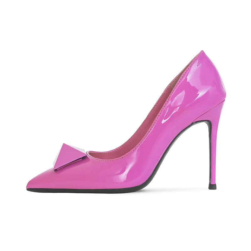 Pink patent leather women's stiletto heels with pointed toe, ankle strap buckle and rivet details.